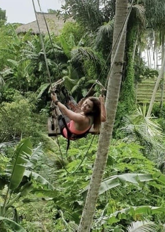 Cristina on a jungle swing in Bali